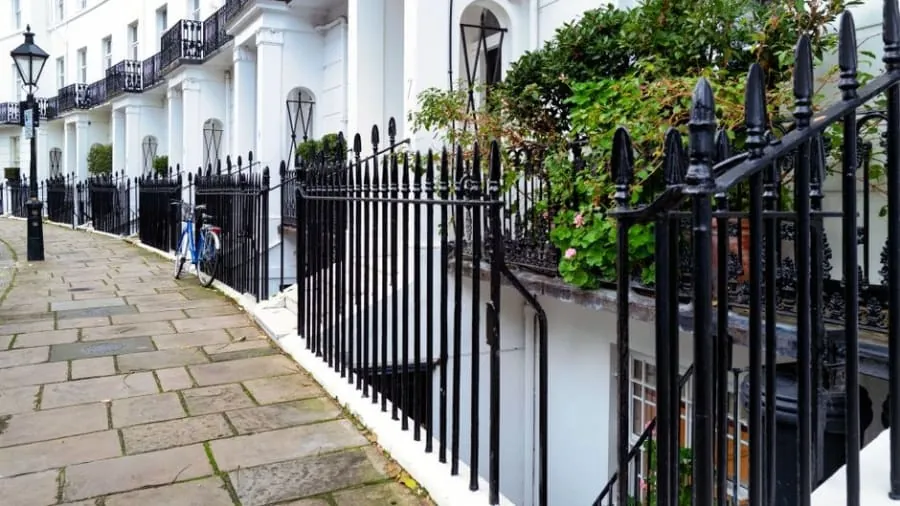 Georgian terrace with railings and basement access typical of kitchen deliveries in Bath