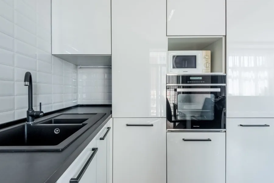 Black composite kitchen sink in a modern Bath kitchen