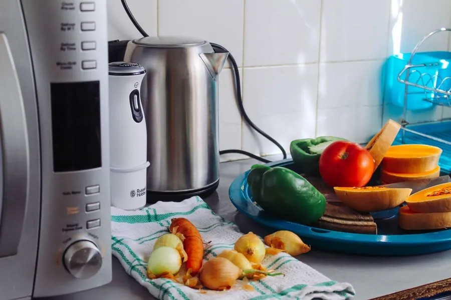 Countertop appliances and fresh food set up as a temporary kitchen during renovation