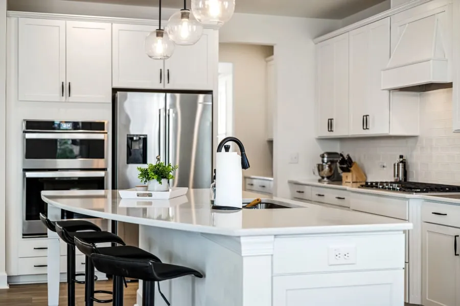 Curved kitchen island on trend in a Bath home