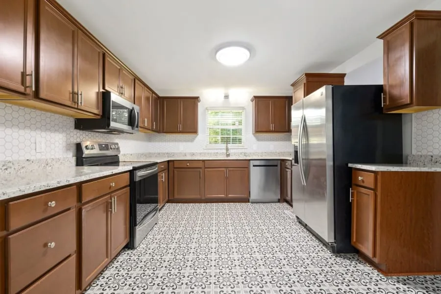 Tiled kitchen floor in a fitted Bath kitchen