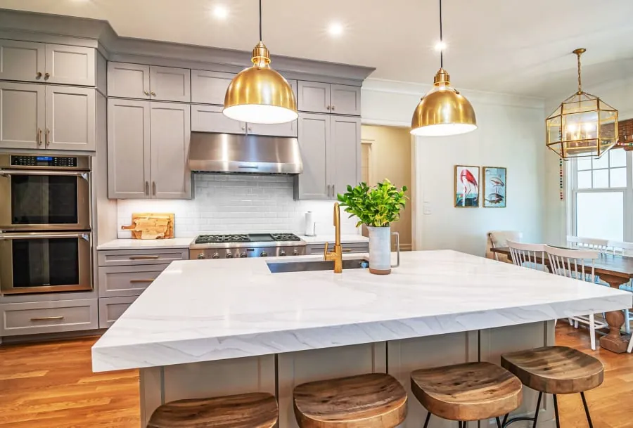 Modern kitchen island with integrated lighting in a Bath home