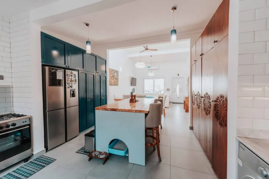 Open-plan kitchen with island and dining area in a Bath home