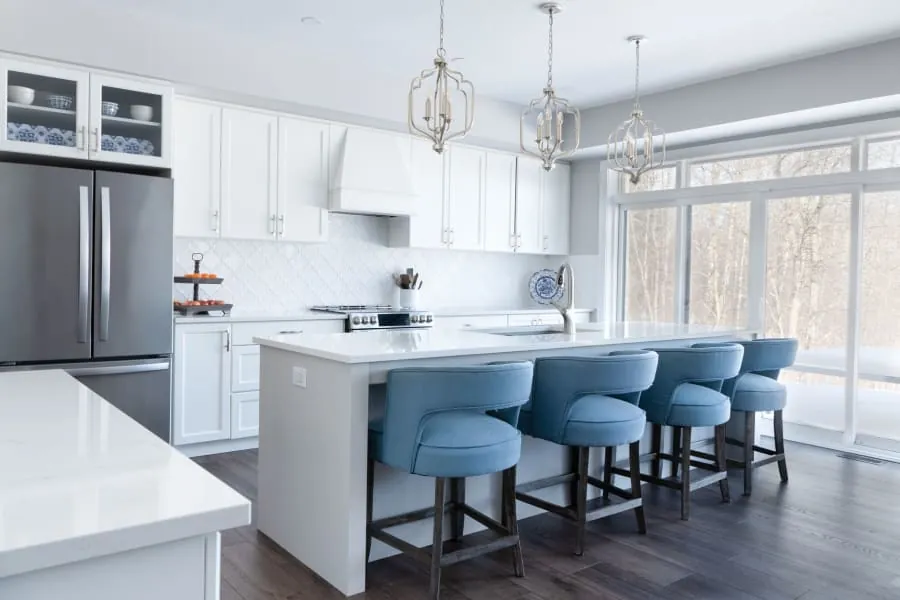Kitchen island with bar stools for seating in a Bath home