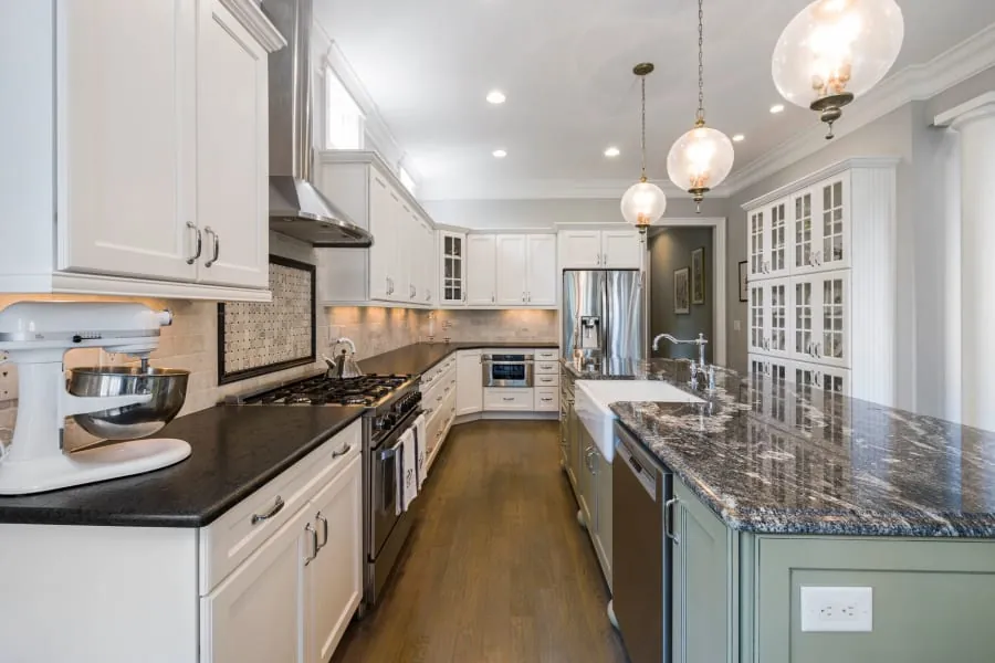 Pendant lights over a kitchen island in a Bath home