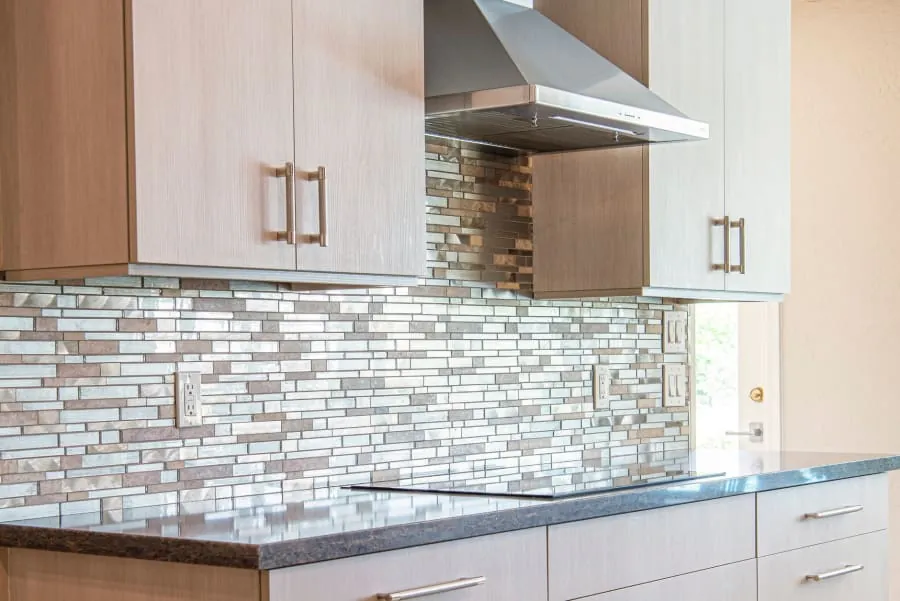 Finished kitchen with a coordinated splashback in a Bath home