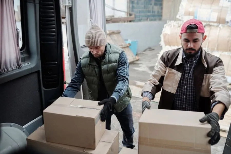 Flat-packed kitchen units stacked ready for delivery to a Bath kitchen installation