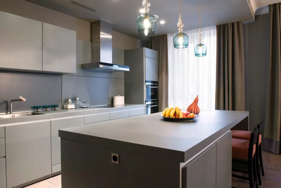 Kitchen island with a stone worktop in a Bath home