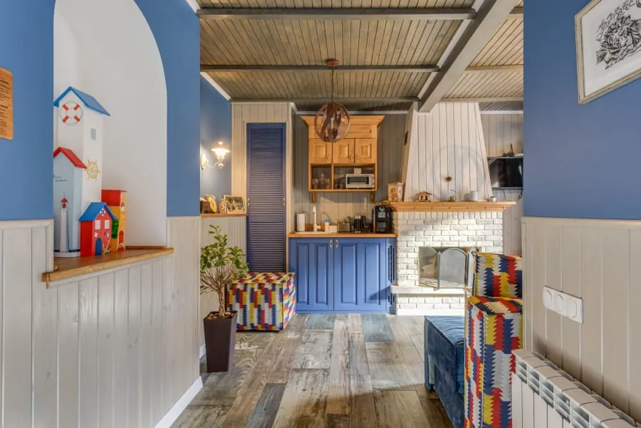Navy blue kitchen cabinets in a Bath home