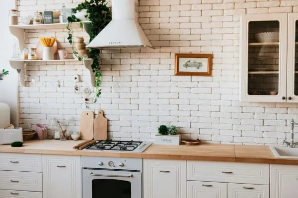 Kitchen with integrated appliances, sink and cabinetry