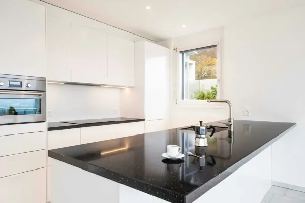 Built-in oven and hob installation in a fitted kitchen