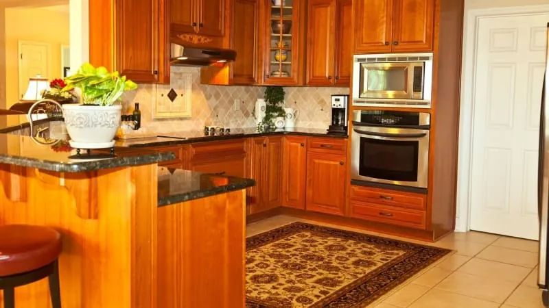 Wooden cabinet kitchen installation in a Bath home